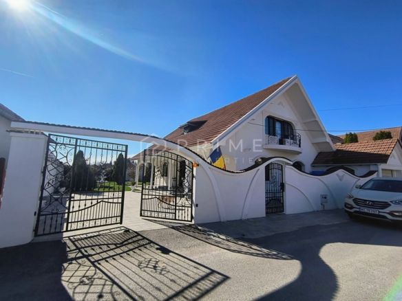 Casa perfectă pentru familie – curte, foișor cu grătar și garaj triplu