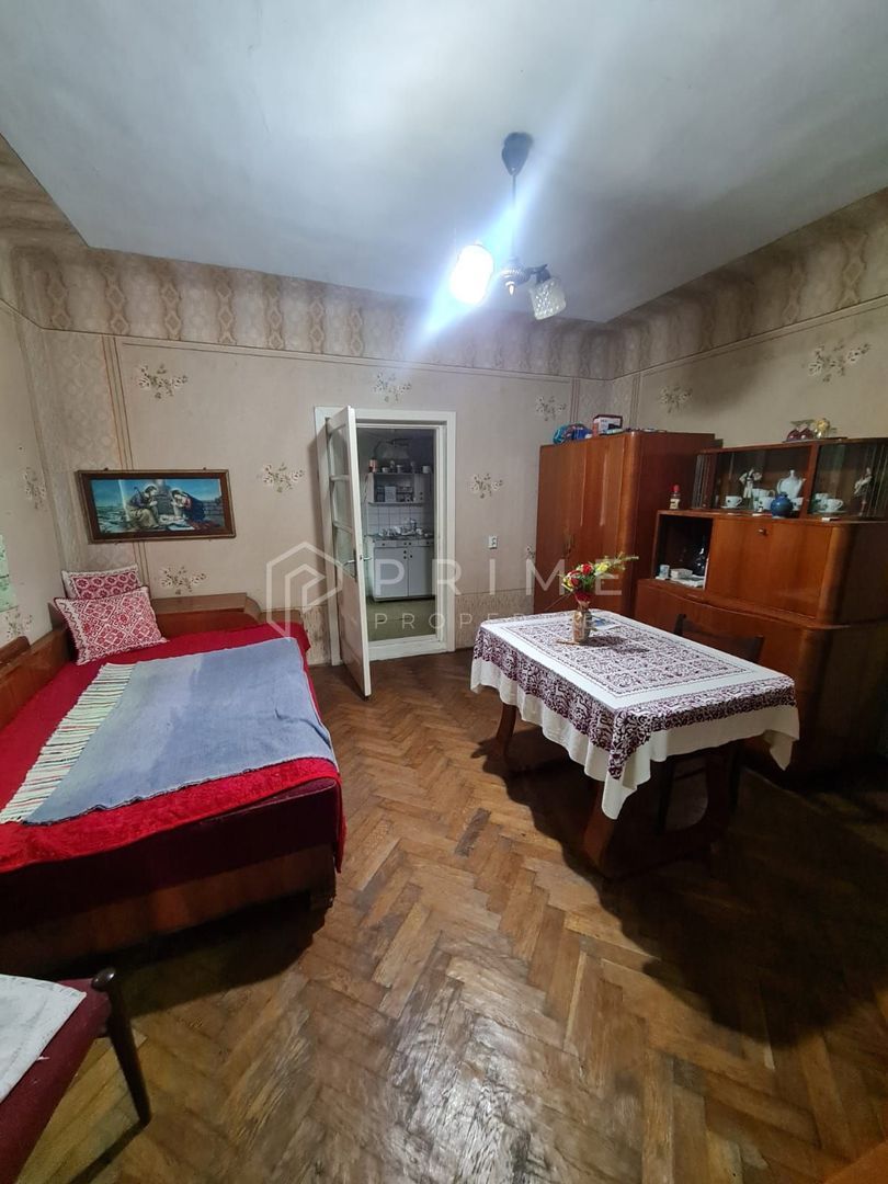 Casă cu teren de 1.000 m² – utilități complete, ideală pentru renovare