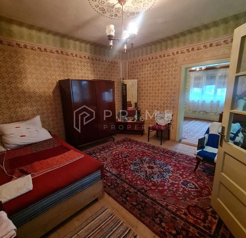 Casă cu teren de 1.000 m² – utilități complete, ideală pentru renovare