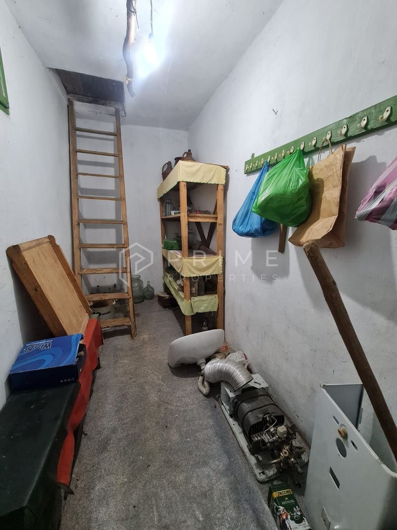 Casă cu teren de 1.000 m² – utilități complete, ideală pentru renovare