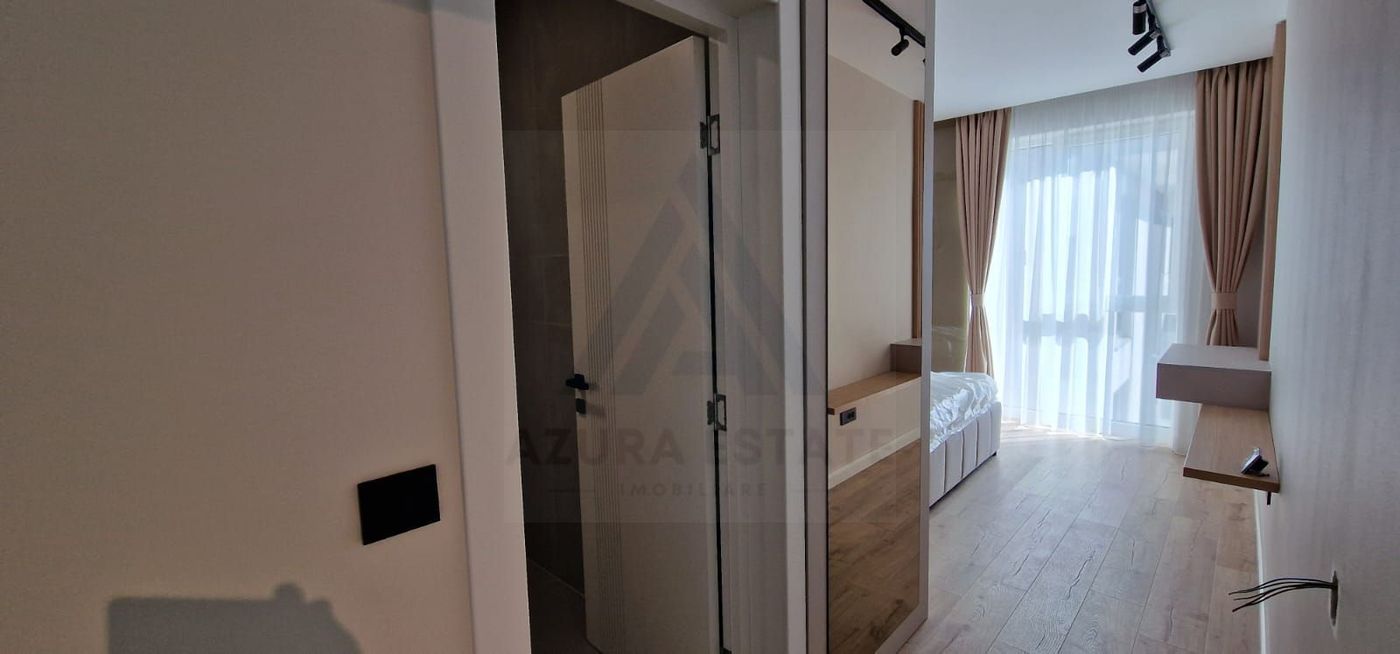 Apartament lux 80 mp utili 3 camere 2 bai si parcare subterana