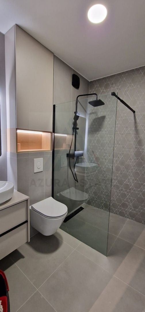 Apartament lux 80 mp utili 3 camere 2 bai si parcare subterana