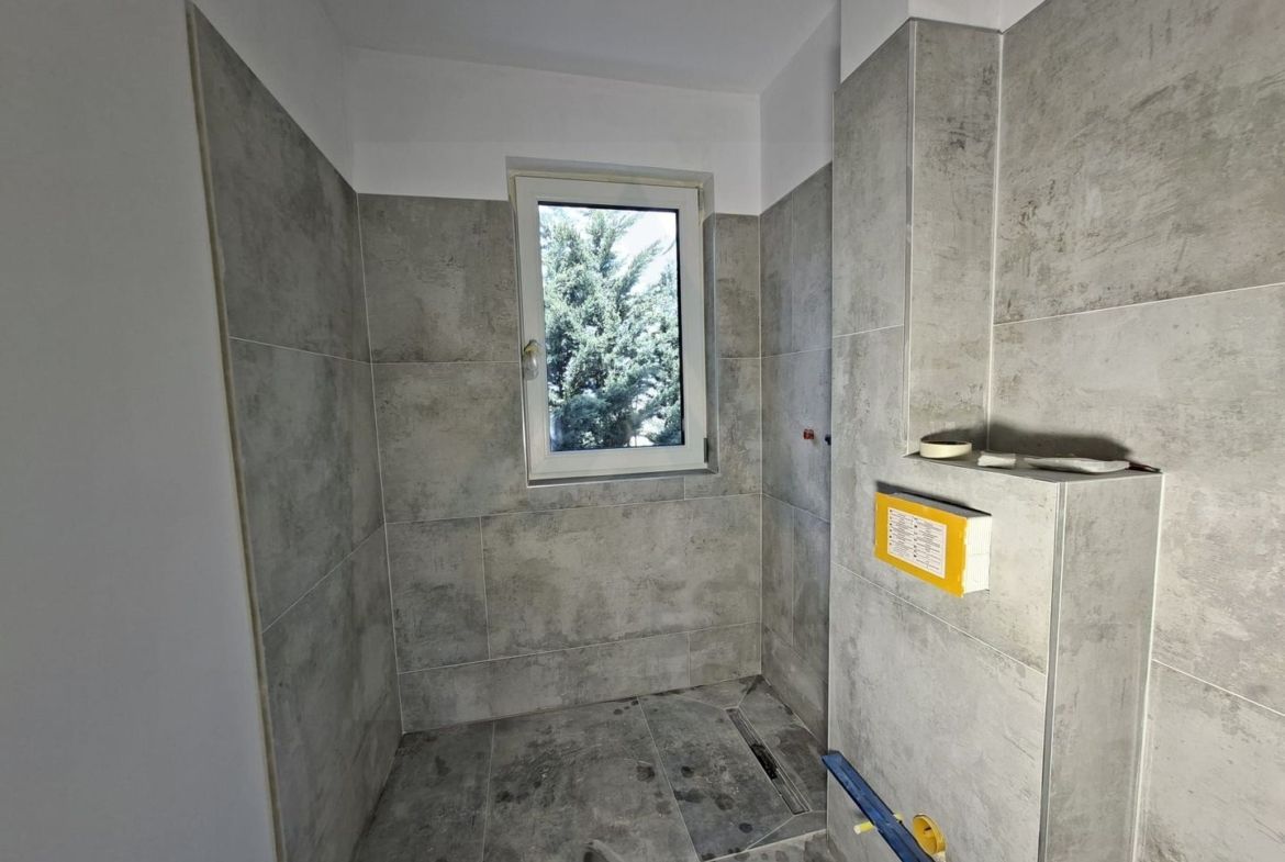 Apartament premium 68.4 mp utili 3 camere 2 bai etaj 1 in Cristian