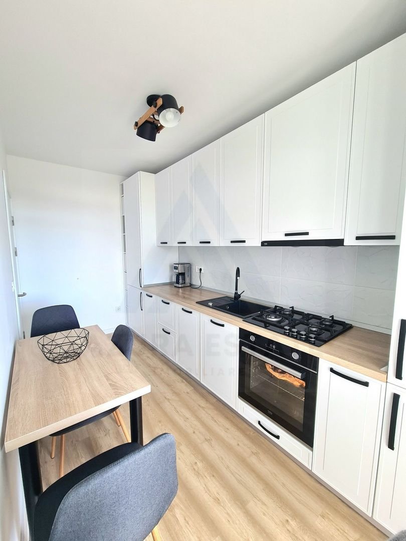 Apartament modern 57 mp utili 2 balcoane loc de parcare zona Lazaret