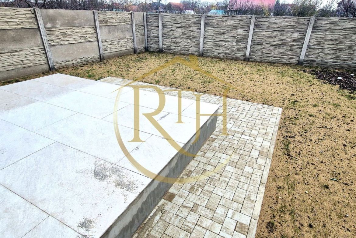 Duplex de vanzare cu 4 camere,2 bai,250 mp teren-Mosnita Veche zona Centrala.