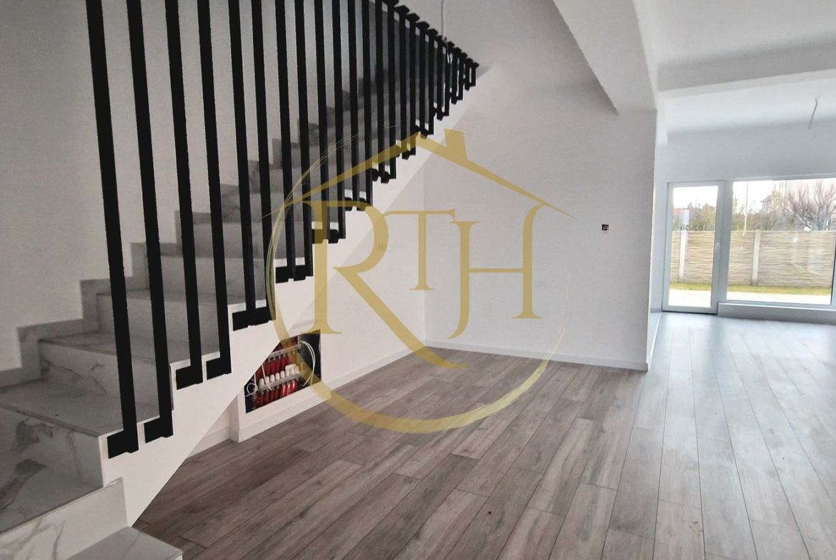 Duplex de vanzare cu 4 camere,2 bai,250 mp teren-Mosnita Veche zona Centrala.