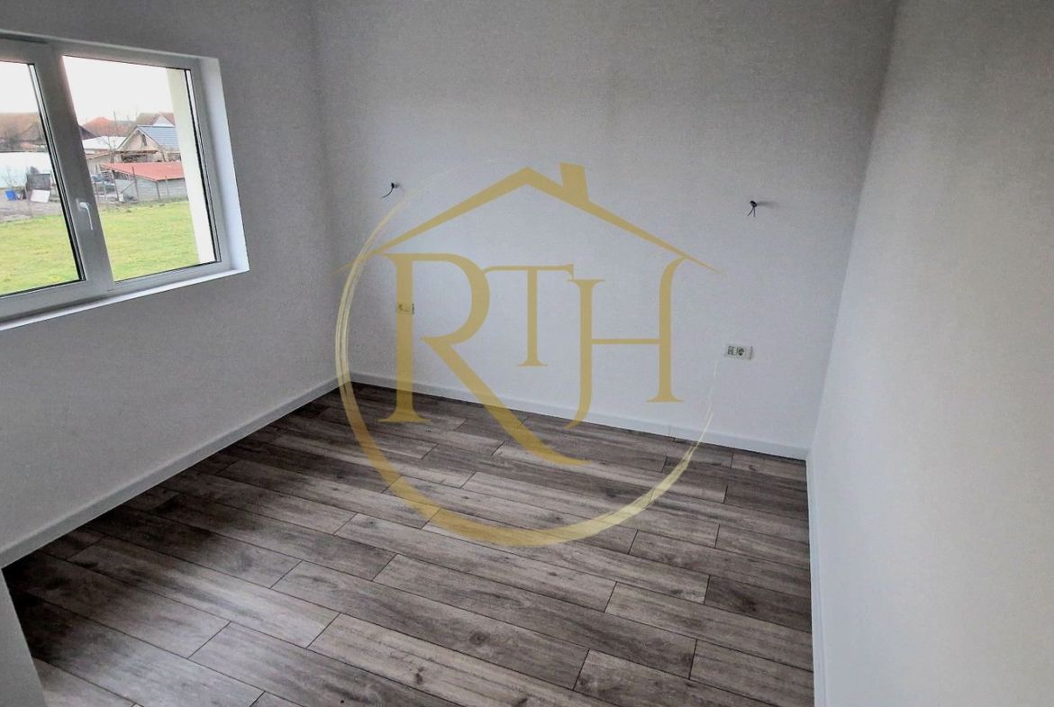 Duplex de vanzare cu 4 camere,2 bai,250 mp teren-Mosnita Veche zona Centrala.
