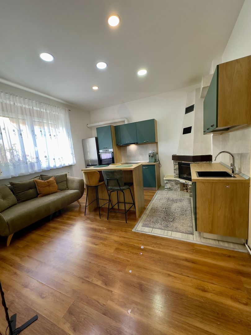 Apartament la casa 76 mp utili terasa curte si pivnita zona Lupeni