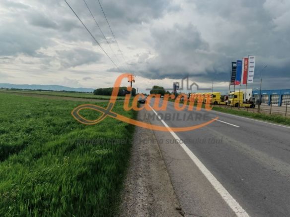 Teren Stupini Calea Feldioarei 11800 mp,25 euro/mp, front asfalt-DN13