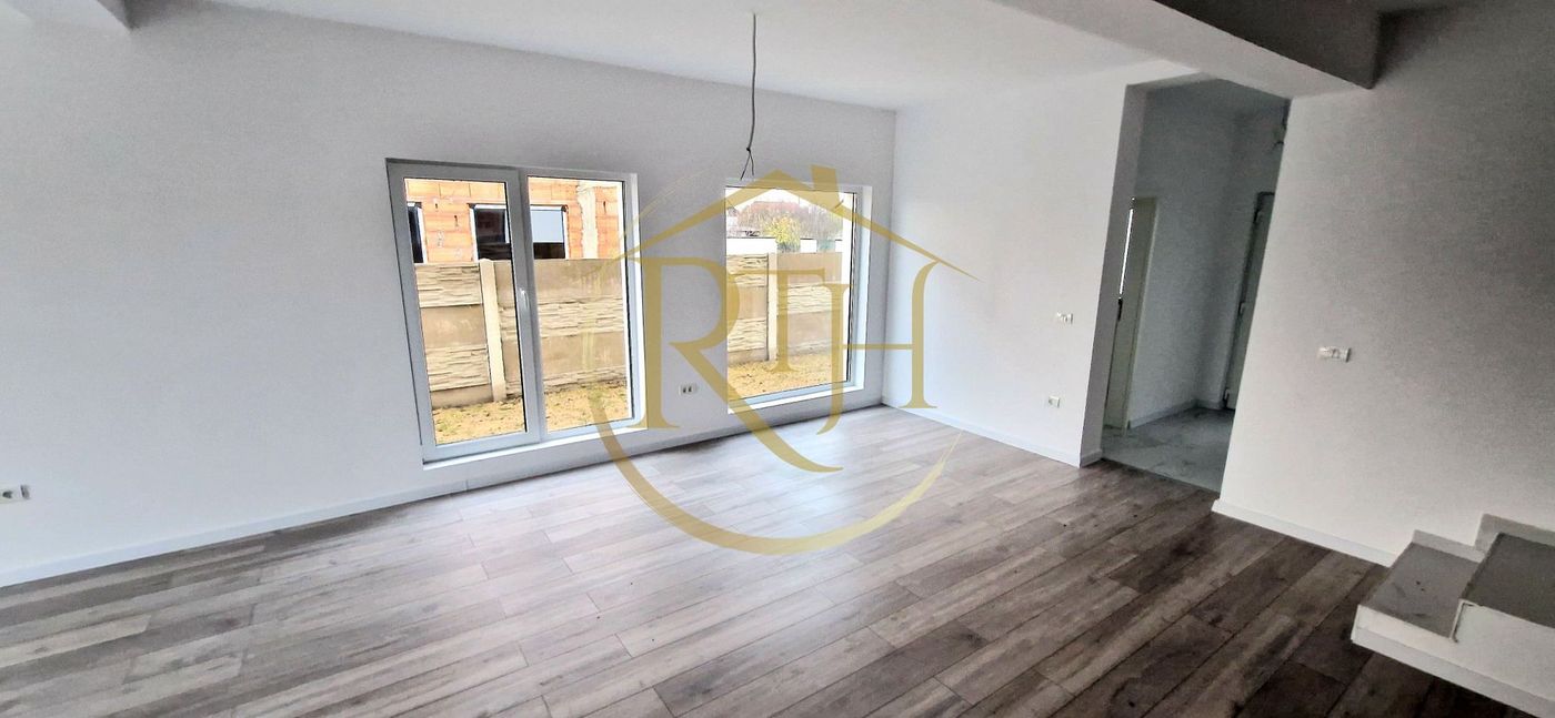 Duplex de vanzare cu 4 camere,2 bai,250 mp teren-Mosnita Veche zona Centrala.