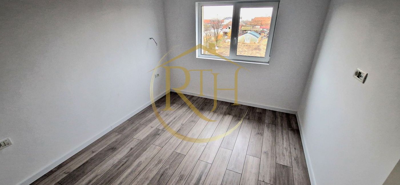 Duplex de vanzare cu 4 camere,2 bai,250 mp teren-Mosnita Veche zona Centrala.