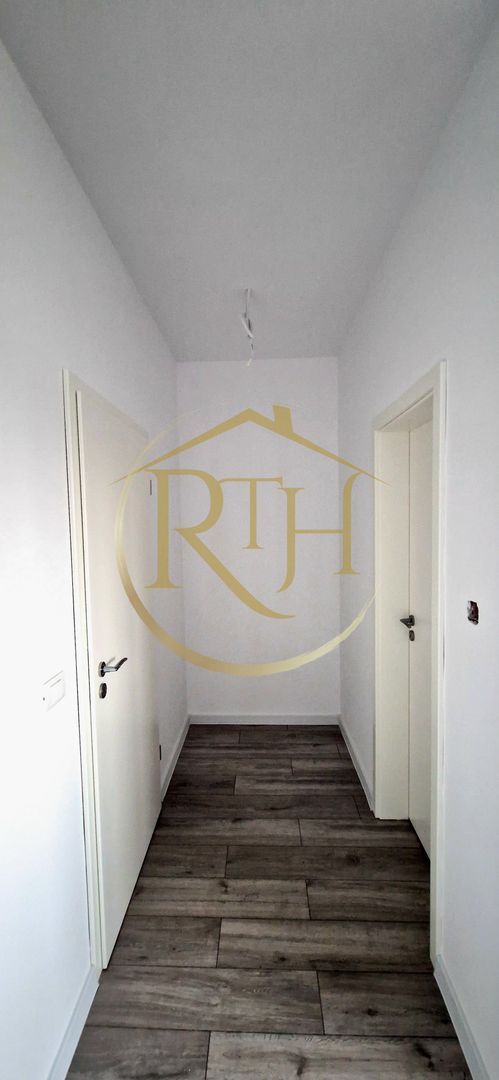Duplex de vanzare cu 4 camere,2 bai,250 mp teren-Mosnita Veche zona Centrala.
