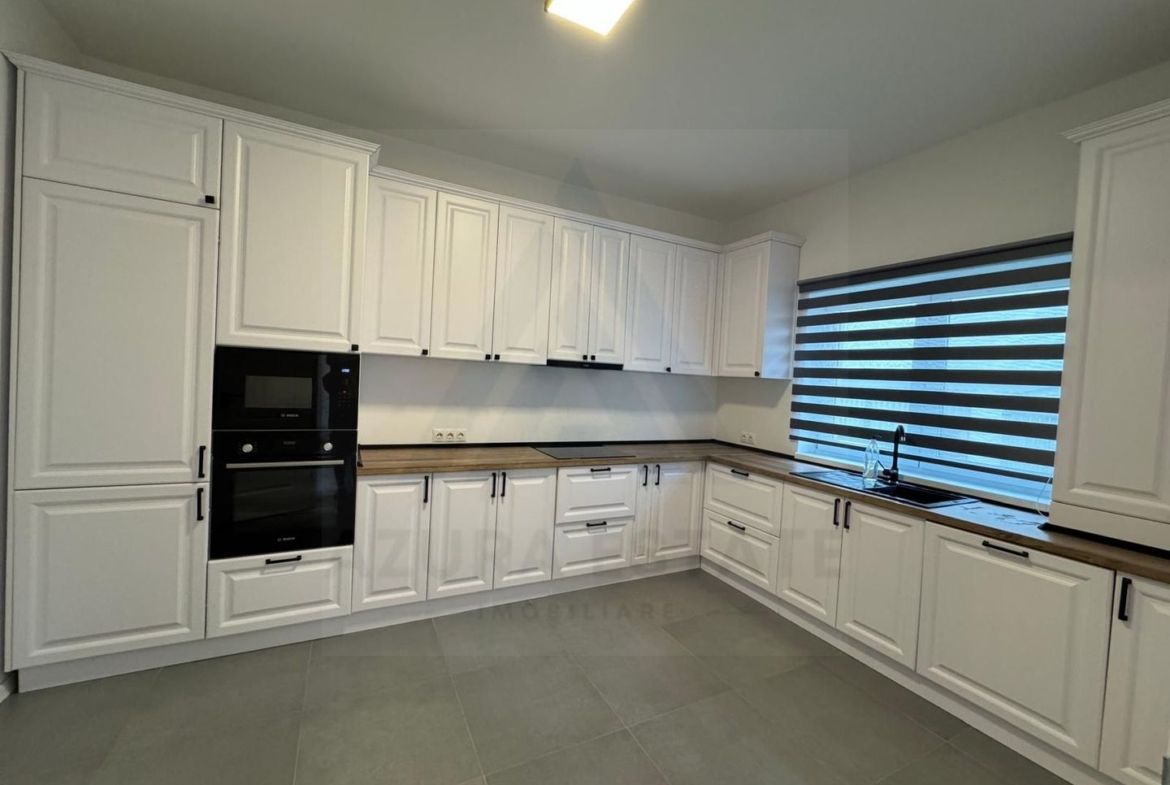 Casa individuala 114 utili 4 camere 2 bai si curte 215 mp in Selimbar