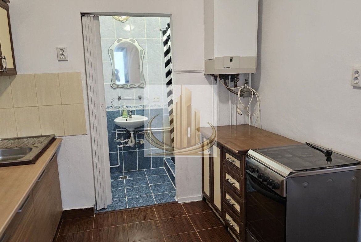 Apartament cu 2 camere de vânzare  la casa in curte comuna