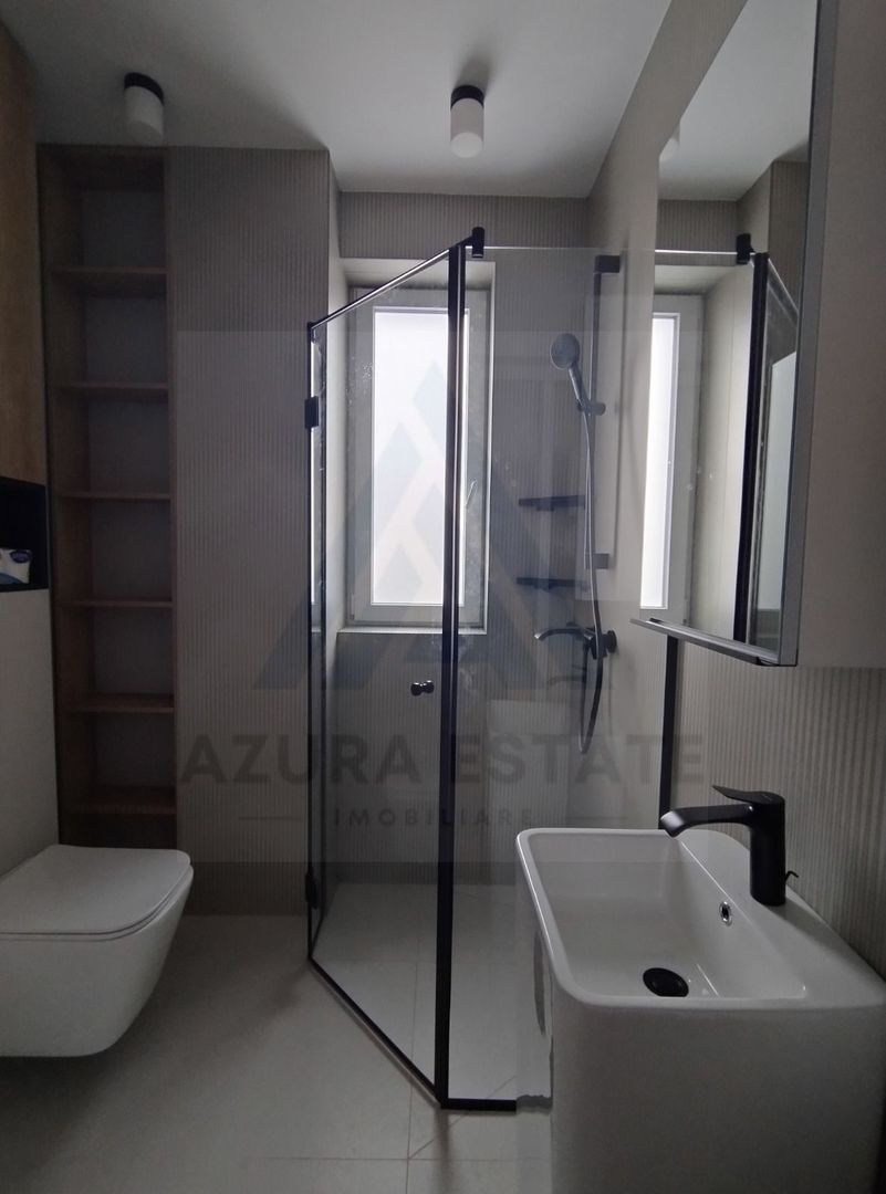 Apartament lux 85 mp utili 3 camere 2 bai si parcare subterana Central