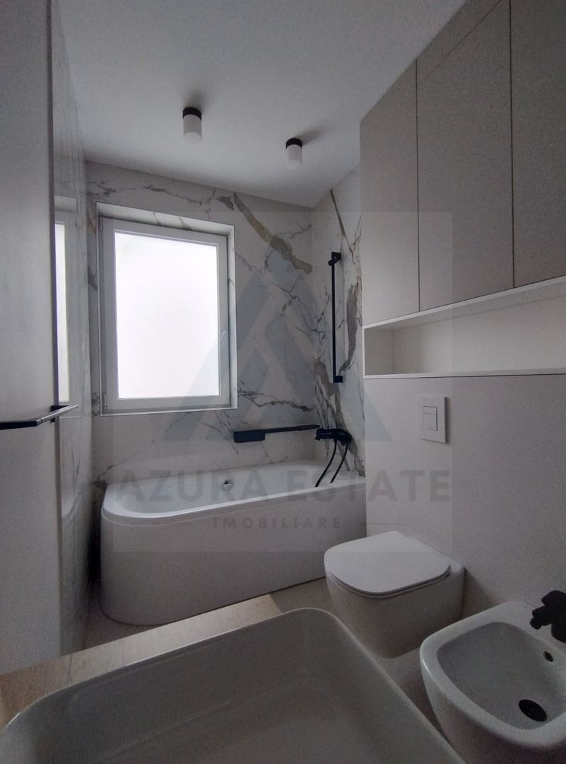 Apartament lux 85 mp utili 3 camere 2 bai si parcare subterana Central