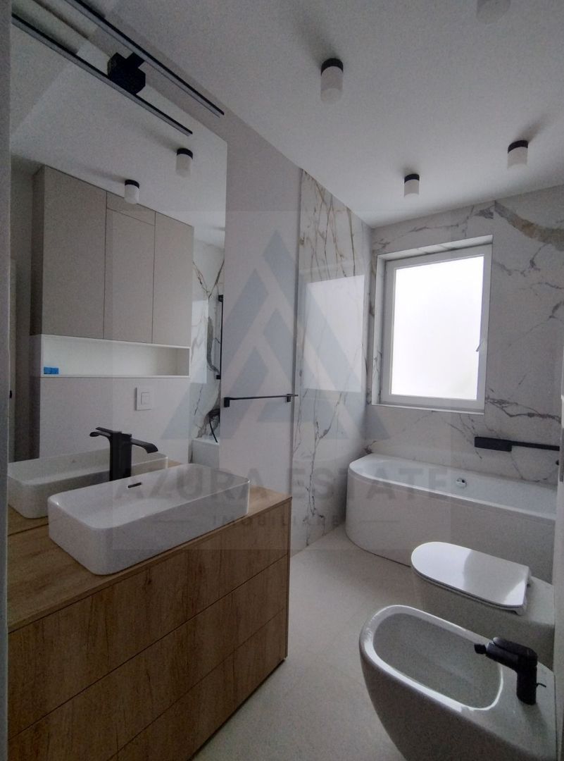 Apartament lux 85 mp utili 3 camere 2 bai si parcare subterana Central