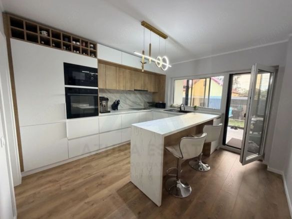 Casa individuala utilata 4 camere 120 mp utili garaj si teren Cristian