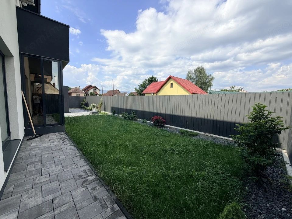 Casa individuala utilata 4 camere 120 mp utili garaj si teren Cristian