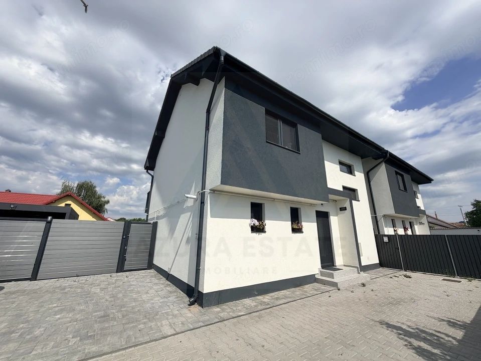 Casa individuala utilata 4 camere 120 mp utili garaj si teren Cristian