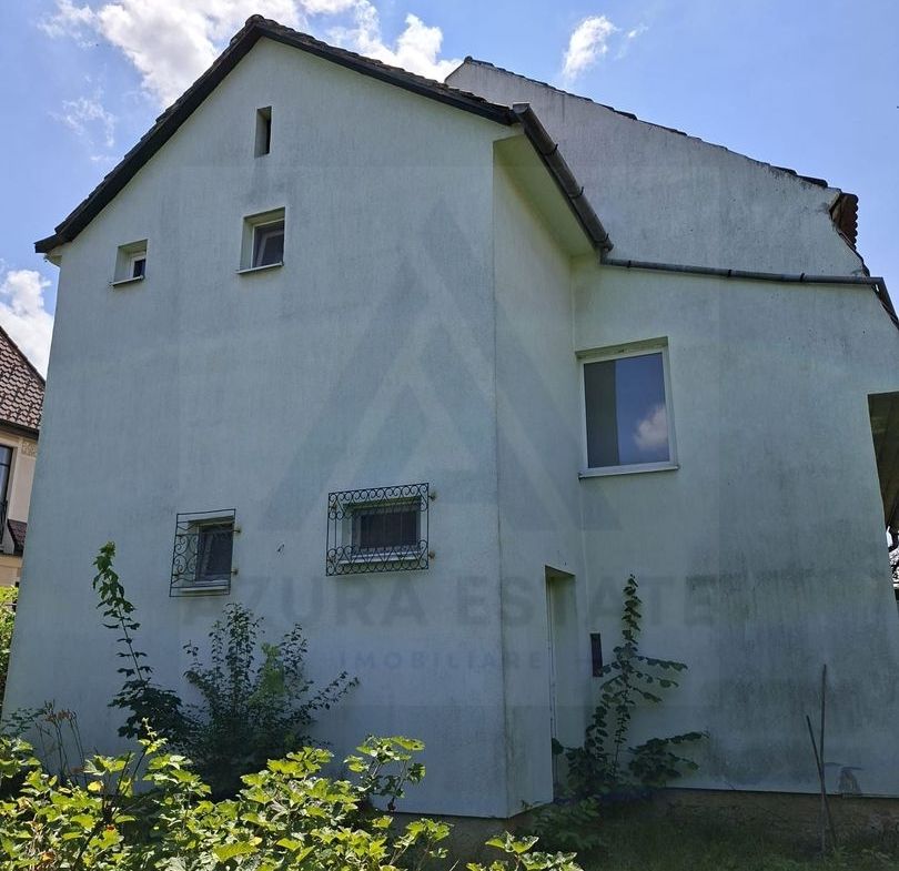 Casa individuala 185 mp utili S + P + E garaj si teren 777 mp Central