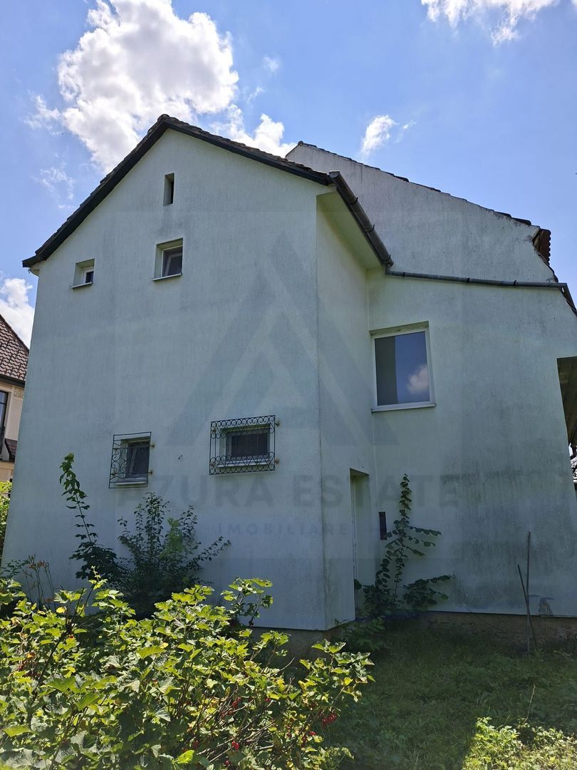 Casa individuala 185 mp utili S + P + E garaj si teren 777 mp Central