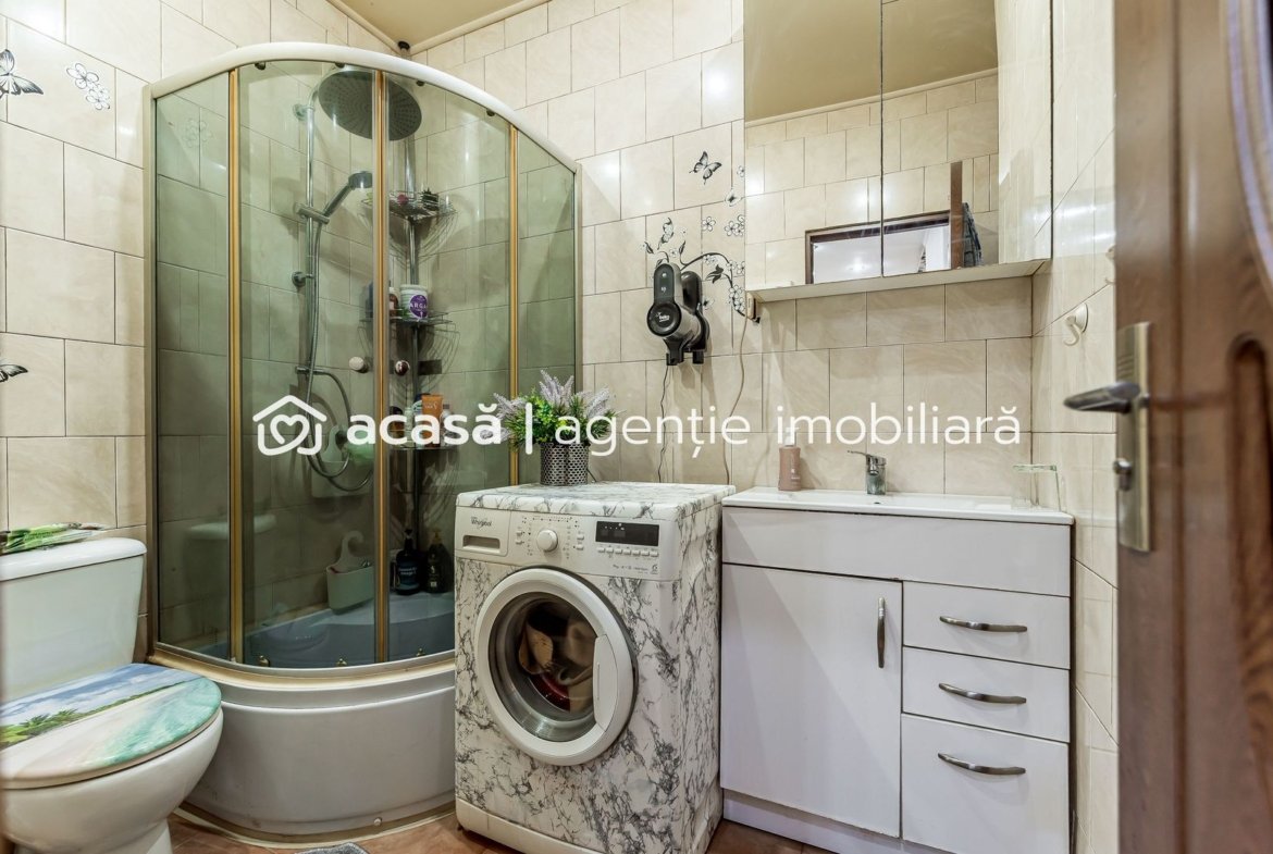 Apartament în centru cu acces auto și garaj propriu