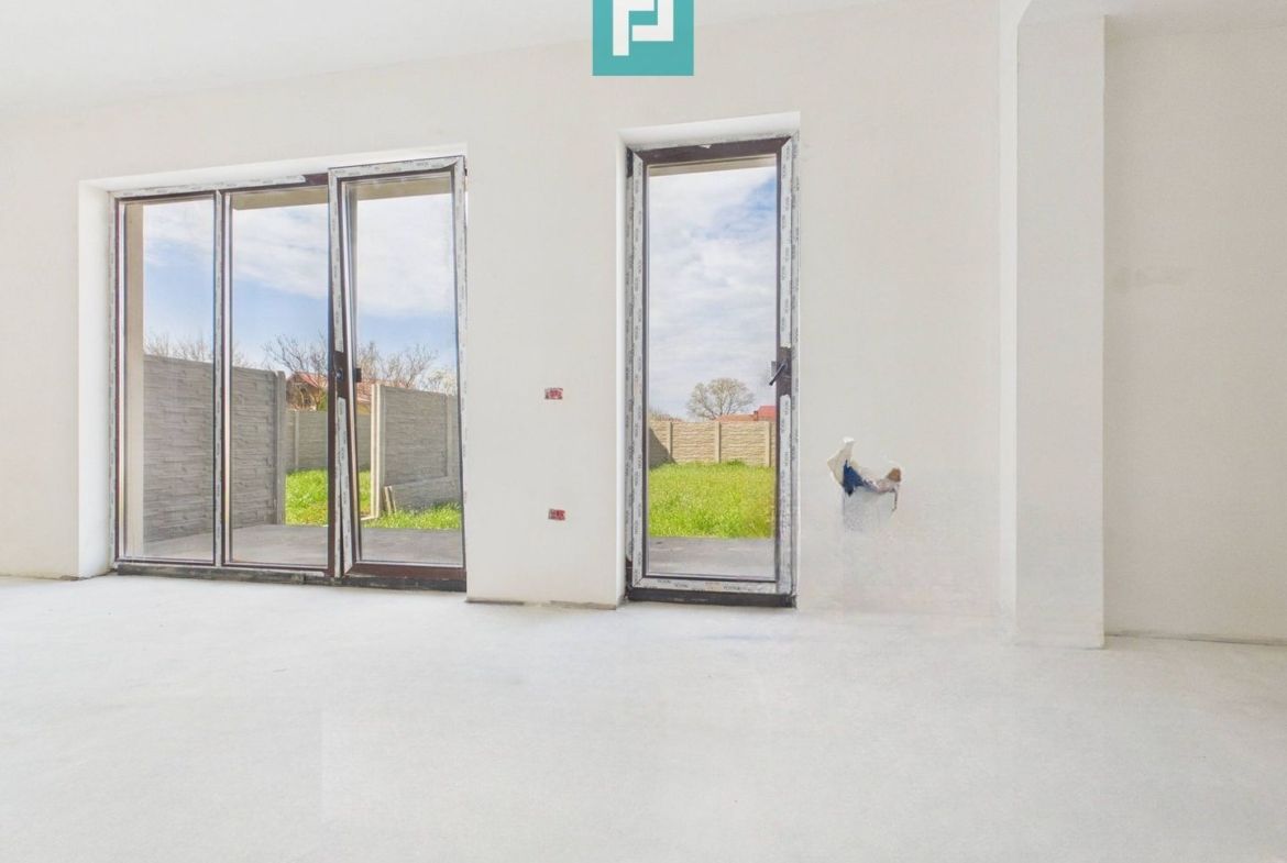 Duplex spațios 102 mp utili, teren 350mp in Covaci