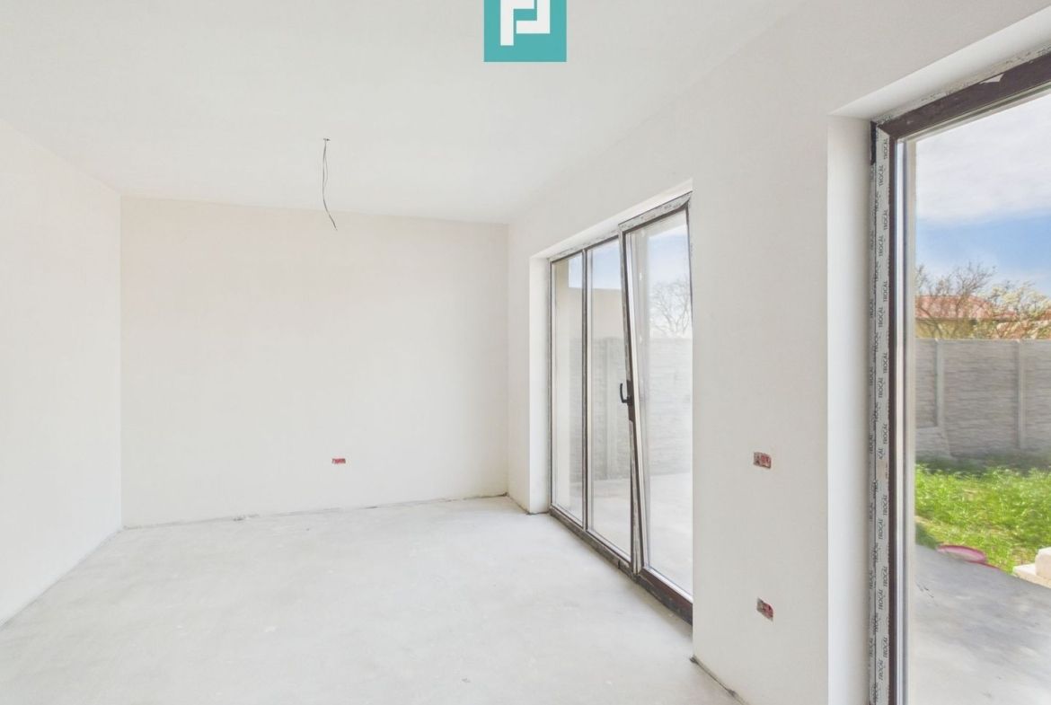 Duplex spațios 102 mp utili, teren 350mp in Covaci