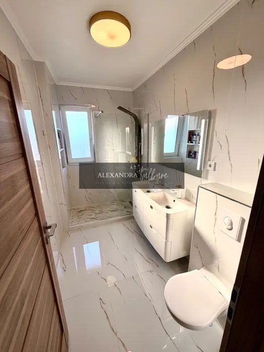 Apartament de vanzare cu 3 camere, 2 bai, balcon, garaj - foto 6