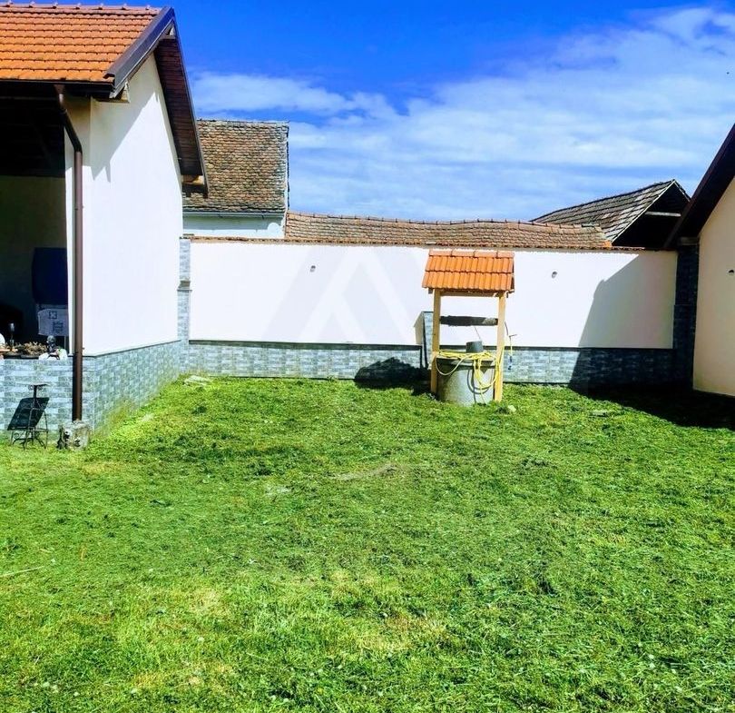 Casa individuala cu garaj 60 mp si teren+gradina 2650 mp in Porumbacu - foto 4