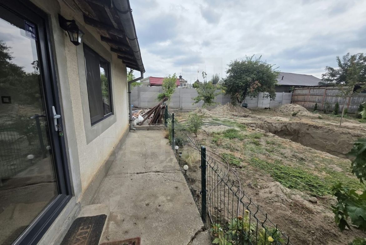 Casa de vanzare in Romanesti cu teren 1200mp mobilata utilata - foto 3