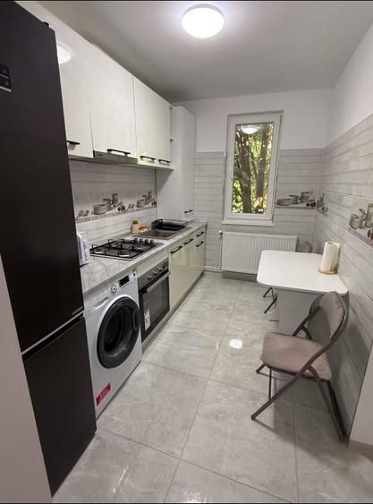De închiriat apartament cu 2 camere în Micro 17, etaj 2, 450 euro - foto 4